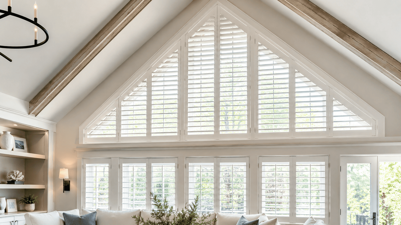 White shutters fitted to a high gable window